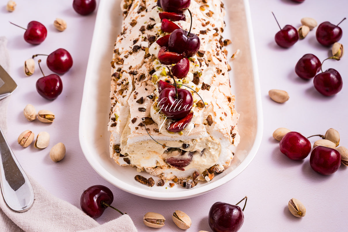 Cherry and Pistachio Meringue Roulade