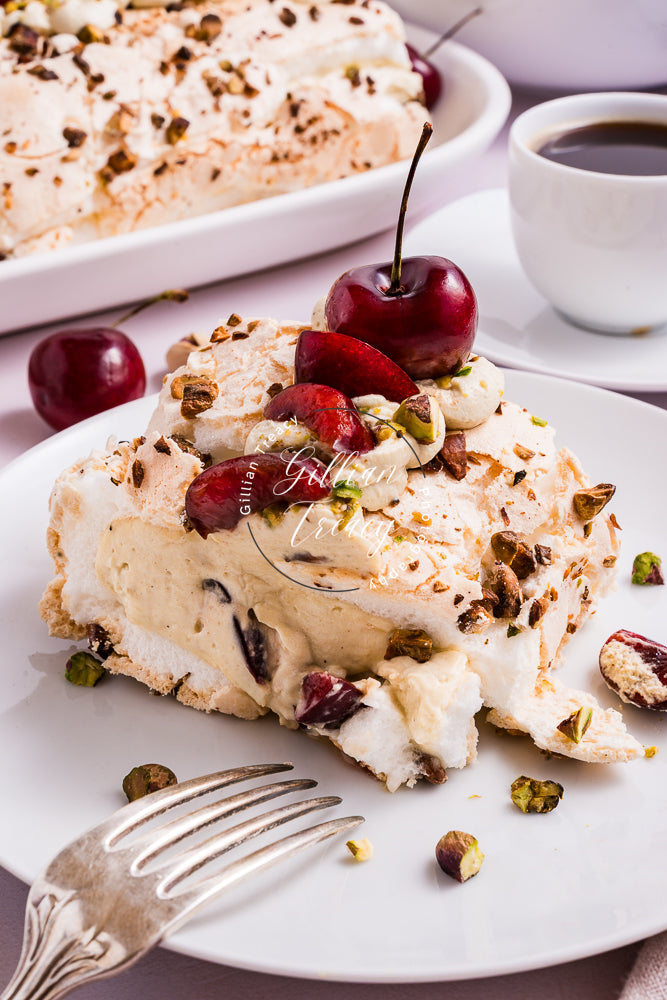 Cherry and Pistachio Meringue Roulade