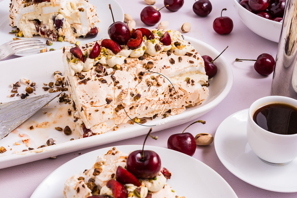 Cherry and Pistachio Meringue Roulade